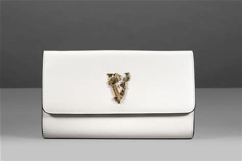 versace pochette in pelle bianca con fibbia scultura v|Borse Donna .